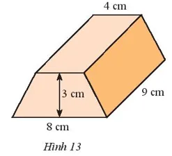 Tính thể tích hình lăng trụ đứng có đáy là hình thang cân với kích thước như Hình13 Bai 4 Trang 63 Toan Lop 7 Tap 1